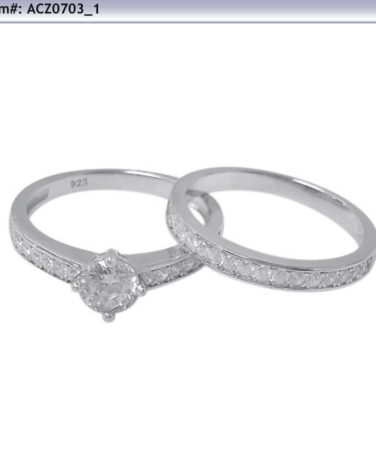 Round cut 4 claw set wedding set