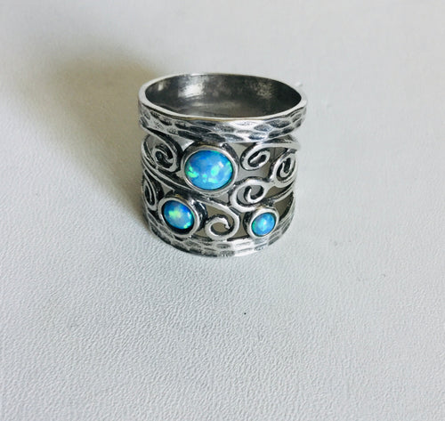Sterling silver swirl cutout /Blue Opal Ring.