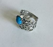 Sterling silver Circular cutout lab Blue Opal Ring.