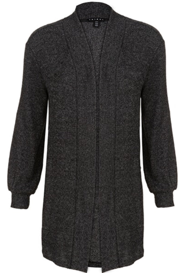 Soft, cozy cardigan sweater with pocket and ribbed texture, finished with a wide trim detail. This is a must have for the closet. Perfect for the office or curling up in a chair with a good book. You deserve it