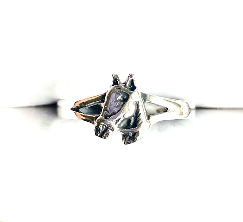 Detailed 3D horse head ring crafted in polished 925 sterling silver with a split shank band against a clean white background.