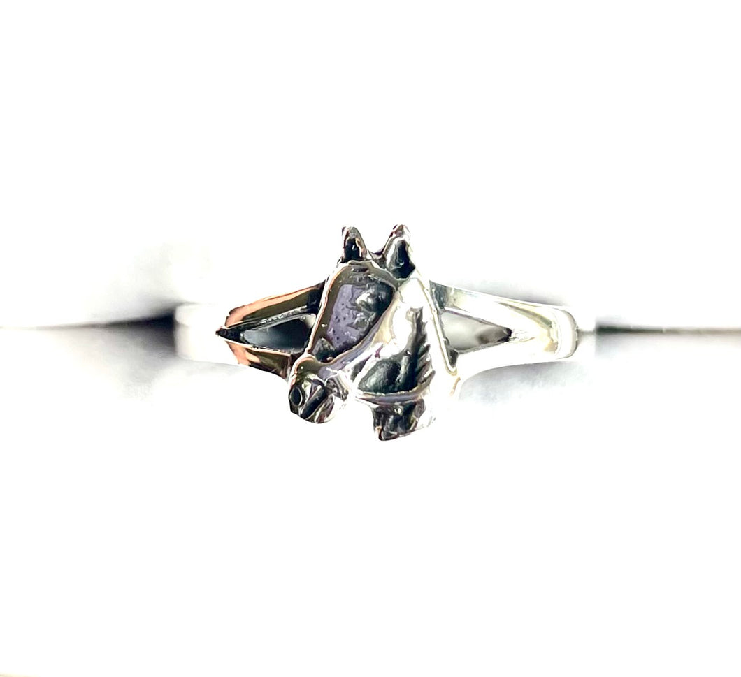 Detailed 3D horse head ring crafted in polished 925 sterling silver with a split shank band against a clean white background.