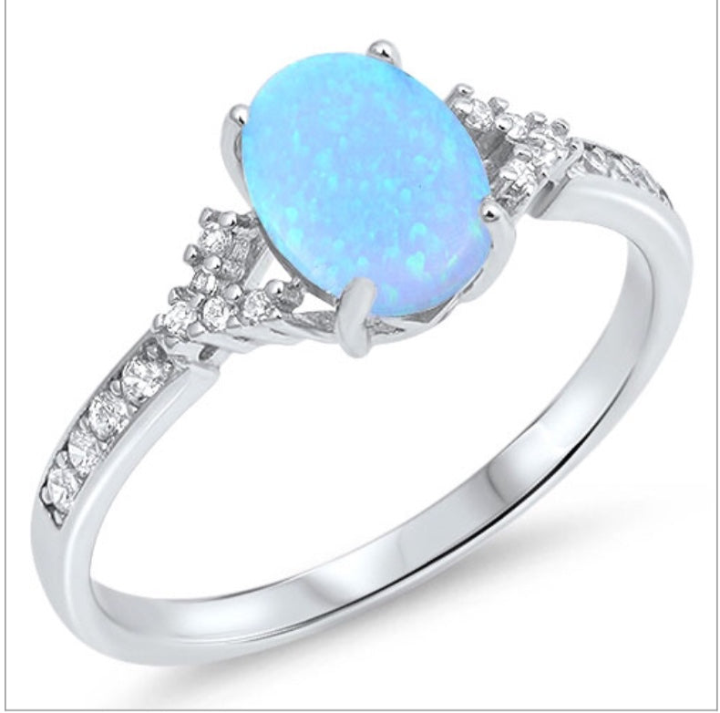 Blue oval Opal stone with Clear cz channel set stones
