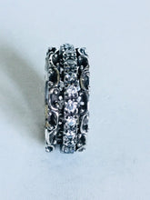 Side cut out Spinner ring with Clear Cubic Zirconia