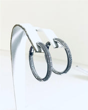 Diamond closure Sterling Silver CZ hoop earrings.