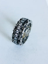 Side cut out Spinner ring with Clear Cubic Zirconia