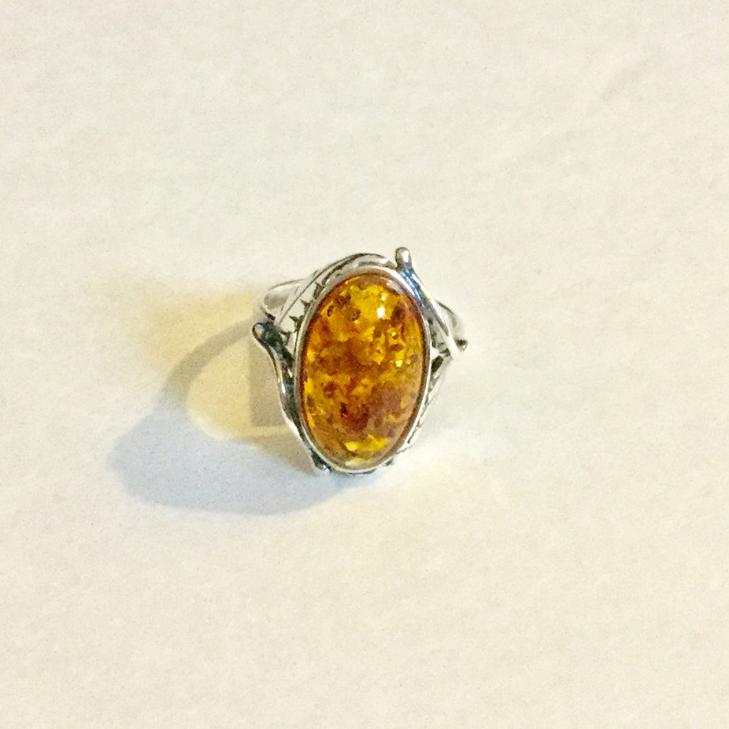 Large Amber piece Set in Leaf detail Ring