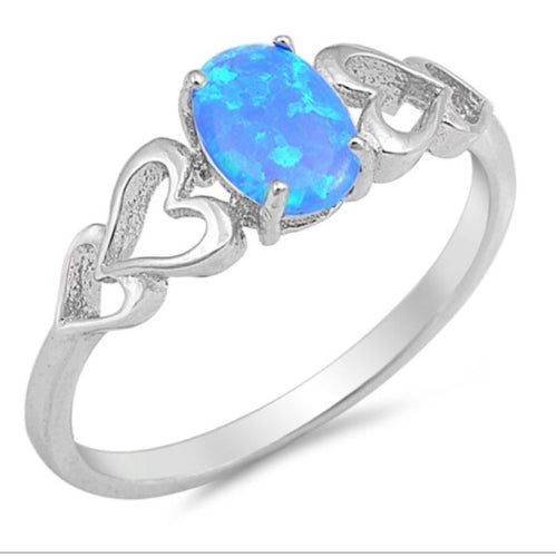 Oval cut Blue Opal and Heart ring