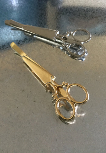 Scissor clip